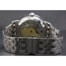 Load image into Gallery viewer, Ajourée, an enchanting interpretation of time brought to its pure skeleton essence. Aesthetically perfected with inventive and meticulous architecture with a flying Tourbillon, encased with high quality 316L stainless steel casing and powered by a 21 jewel automatic movement with a 60-hour power reserve and a moon phase.