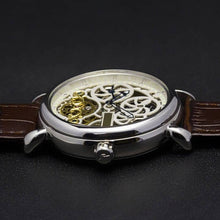Load image into Gallery viewer, Masterpiece, an enchanting interpretation of time brought to its pure skeleton essence. Aesthetically perfected with inventive and meticulous architecture with a flying Tourbillon, encased with high quality 316L stainless steel casing and powered by a 21 jewel automatic movement with a 60-hour power reserve and a moon phase.