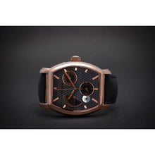 Load image into Gallery viewer, Le Cadre is a venture into fine craftsmanship and an elevation of contemporary design. Exuding an air of fine taste and class with a flawless aesthetic face, the rose-gold coated stainless steel rectangular structure embodies sheer exclusivity. Features include a flying Tourbillon within our signature Matt Arend skeleton calibre, 21 jewel automatic movement with a 60-hour power reserve, day/night, date, hour, minute, second, dual time zone and power reserve of moment indicator functions.