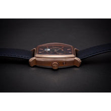 Load image into Gallery viewer, Le Cadre is a venture into fine craftsmanship and an elevation of contemporary design. Exuding an air of fine taste and class with a flawless aesthetic face, the rose-gold coated stainless steel rectangular structure embodies sheer exclusivity. Features include a flying Tourbillon within our signature Matt Arend skeleton calibre, 21 jewel automatic movement with a 60-hour power reserve, day/night, date, hour, minute, second, dual time zone and power reserve of moment indicator functions.