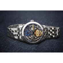 Load image into Gallery viewer, Fleur Ajourée, an enchanting interpretation of time brought to its pure skeleton essence. Aesthetically perfected with inventive and meticulous architecture with the gorgeously crafted open heart, encased with high quality 316L stainless steel casing and powered by a 21 jewel automatic movement with a 60-hour power reserve and a moon phase.