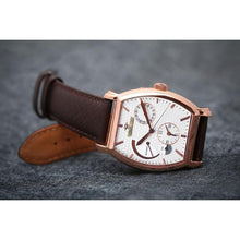 Load image into Gallery viewer, Le Cadre is a venture into fine craftsmanship and an elevation of contemporary design. Exuding an air of fine taste and class with a flawless aesthetic face, the rose-gold coated stainless steel rectangular structure embodies sheer exclusivity. Features within our signature Matt Arend calibre, 21 jewel automatic movement with a 60-hour power reserve, day/night, date, hour, minute, second, dual time zone and power reserve of moment indicator functions.
