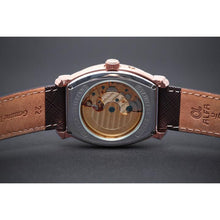 Load image into Gallery viewer, Le Cadre is a venture into fine craftsmanship and an elevation of contemporary design. Exuding an air of fine taste and class with a flawless aesthetic face, the rose-gold coated stainless steel rectangular structure embodies sheer exclusivity. Features within our signature Matt Arend calibre, 21 jewel automatic movement with a 60-hour power reserve, day/night, date, hour, minute, second, dual time zone and power reserve of moment indicator functions.