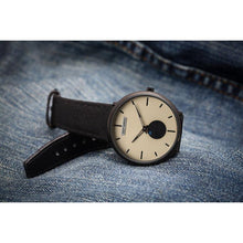 Load image into Gallery viewer, Our new Minimalist Series focused on the Essentials, telling time in an aesthetic way! Clean yet stylish accents on the dial with our brushed stainless steel logo, dual color hands and a high quality genuine leather strap make this new line a clearly superior offer for the affordable investment it represents. The Watch is flawlessly finished, sleek and slim in design and appeals to the very modern Gentleman / -woman.