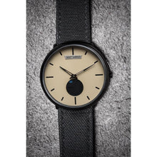Load image into Gallery viewer, Our new Minimalist Series focused on the Essentials, telling time in an aesthetic way! Clean yet stylish accents on the dial with our brushed stainless steel logo, dual color hands and a high quality genuine leather strap make this new line a clearly superior offer for the affordable investment it represents. The Watch is flawlessly finished, sleek and slim in design and appeals to the very modern Gentleman / -woman.