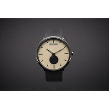 Load image into Gallery viewer, Our new Minimalist Series focused on the Essentials, telling time in an aesthetic way! Clean yet stylish accents on the dial with our brushed stainless steel logo, dual color hands and a high quality genuine leather strap make this new line a clearly superior offer for the affordable investment it represents. The Watch is flawlessly finished, sleek and slim in design and appeals to the very modern Gentleman / -woman.