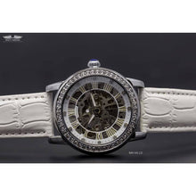 Load image into Gallery viewer, The Constellation series indicate creativity, class and confidence. The charismatic character of its skeleton face and zirconia filled casing make this truly a watch for a lady with capital L.