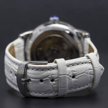 Load image into Gallery viewer, The Constellation series indicate creativity, class and confidence. The charismatic character of its skeleton face and zirconia filled casing make this truly a watch for a lady with capital L.