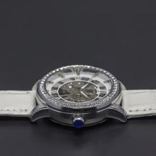 Load image into Gallery viewer, The Constellation series indicate creativity, class and confidence. The charismatic character of its skeleton face and zirconia filled casing make this truly a watch for a lady with capital L.