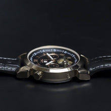 Load image into Gallery viewer, Andaluz is a powerful yet elegant expression of the male fascination with mechanical watch making. Features include day and month calendar, hours, minutes, seconds. The movement of the watch is visible through its transparent back. Extrovert, confident and elegant.