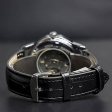 Load image into Gallery viewer, The Blue Mariner series distinguishes itself with an extraordinary hexagon shape of the watch face that adds an extra character to a visually exciting design. Blue Mariner is about striking colors and simplicity with functionality. The movement charges kinetically (by wearing and moving your wrist) or alternatively can be wound on the crown.