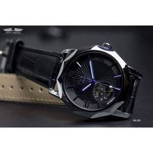 Load image into Gallery viewer, The Blue Mariner series distinguishes itself with an extraordinary hexagon shape of the watch face that adds an extra character to a visually exciting design. Blue Mariner is about striking colors and simplicity with functionality. The movement charges kinetically (by wearing and moving your wrist) or alternatively can be wound on the crown.