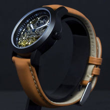 Load image into Gallery viewer, Esprit Libre, a delicate showcase of the fine essence of a skeleton timepiece. Aesthetically perfected with inventive and meticulous architecture with a flying Tourbillon, encased with high quality 316L stainless steel casing and powered by a 21 jewel automatic movement with a 60-hour power reserve and a moon phase.