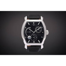 Load image into Gallery viewer, Le Cadre is a venture into fine craftsmanship and an elevation of contemporary design. Exuding an air of fine taste and class with a flawless aesthetic face, the silver coated stainless steel rectangular structure embodies sheer exclusivity. Features include a flying Tourbillon within our signature Matt Arend skeleton calibre, 21 jewel automatic movement with a 60-hour power reserve, day/night, date, hour, minute, second, dual time zone and power reserve of moment indicator functions.