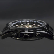 Load image into Gallery viewer, A brand new edition in our Elements series comes with darker features for the modern gentleman. Equipped with black coated stainless steel case and strap and a black metallic face to give this timepiece its solid masculine character. Features include hour, minute, second, date and month indicators and an automatic mechanical chronometer with a 48-hour power reserve.
