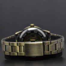 Load image into Gallery viewer, Our Vintage Collection entails a delicate blend of the fine art of mechanical watchmaking with a look and feel that is slightly rugged yet refined. The very first release within our Vintage Series features a bronze vintage metal strap making up for an irresistible old school vintage look. Simply said, artistically crafted and made complete for Him.
