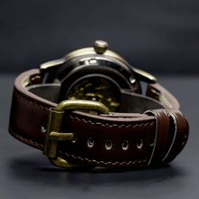 Load image into Gallery viewer, Our Vintage Collection entails a delicate blend of the fine art of mechanical watchmaking with a look and feel that is slightly rugged yet refined. One of the first releases within our Vintage Series features our successful Spherique Model with a burgundy leather strap making up for an irresistible combination of old school vintage looks and modern materials. Simply said, artistically crafted and made complete for Him.
