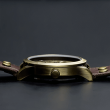 Load image into Gallery viewer, Our Vintage Collection entails a delicate blend of the fine art of mechanical watchmaking with a look and feel that is slightly rugged yet refined. One of the first releases within our Vintage Series features our successful Spherique Model with a burgundy leather strap making up for an irresistible combination of old school vintage looks and modern materials. Simply said, artistically crafted and made complete for Him.
