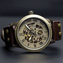 Load image into Gallery viewer, Our Vintage Collection entails a delicate blend of the fine art of mechanical watchmaking with a look and feel that is slightly rugged yet refined. One of the first releases within our Vintage Series features our successful Spherique Model with a burgundy leather strap making up for an irresistible combination of old school vintage looks and modern materials. Simply said, artistically crafted and made complete for Him.
