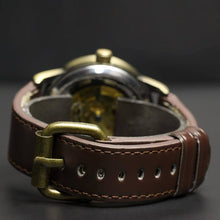 Load image into Gallery viewer, Our Vintage Collection entails a delicate blend of the fine art of mechanical watchmaking with a look and feel that is slightly rugged yet refined. The latest release within our Vintage Series features our successful Perennial model with a brown standard leather strap making up for an irresistible combination of old school vintage looks and modern materials. Simply said, artistically crafted and made complete for Him.
