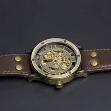 Load image into Gallery viewer, Our Vintage Collection entails a delicate blend of the fine art of mechanical watchmaking with a look and feel that is slightly rugged yet refined. The latest release within our Vintage Series features our successful Perennial model with a brown standard leather strap making up for an irresistible combination of old school vintage looks and modern materials. Simply said, artistically crafted and made complete for Him.
