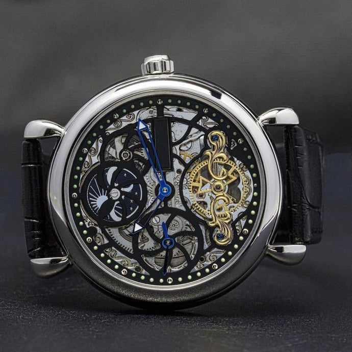 Masterpiece Minuit, an enchanting interpretation of time brought to its pure skeleton essence. Aesthetically perfected with inventive and meticulous architecture with a flying Tourbillon, encased with high quality 316L stainless steel casing and powered by a 21 jewel automatic movement with a 60-hour power reserve and a moon phase.