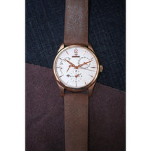 Load image into Gallery viewer, L&#39;Atelier Dual Time is a venture into fine craftsmanship and an elevation of contemporary design. Exuding an air of fine taste and class with a flawless aesthetic face, the satin brushed rose-gold stainless steel casing embodies modern exclusivity. Features include a Date, Day/Night Indicator, Second Time Zone and a Power Reserve Display showing you exactly the percentage remaining on the self winding 21 jewel automatic calibre.
