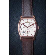 Load image into Gallery viewer, Le Cadre is a venture into fine craftsmanship and an elevation of contemporary design. Exuding an air of fine taste and class with a flawless aesthetic face, the rose-gold coated stainless steel rectangular structure embodies sheer exclusivity. Features within our signature Matt Arend calibre, 21 jewel automatic movement with a 60-hour power reserve, day/night, date, hour, minute, second, dual time zone and power reserve of moment indicator functions.
