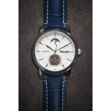 Load image into Gallery viewer, Tour De Blanche salutes the traditional craftsmanship with all the ingredients for a true watch collector. Distinctly confident and classic with exclusive features including moon phase, minute, hour, second indicators, open heart caliber with a flying Tourbillon providing a 60-hour power reserve for precision and focus.
