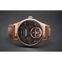 Load image into Gallery viewer, A mechanical watch is like a musical composition where melody, chord progression, and tempo create the perfect piece. Our latest addition is a masterpiece in classic elegance and modern looks. With a full Rose-gold casing, elegant numerals and baton hands on a satin black backdrop and perfected with a padded light brown leather strap, this piece will upgrade your style in every possible way.
