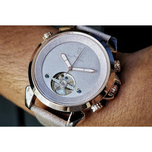 Load image into Gallery viewer, This gorgeous creation for her represents the best of modern elegance. Kept to smooth and elegant shades of rose-gold and a caramel pearl finish, the watch makes a statement in every situation, being it the corporate environment or when it is time to celebrate life. The combination is perfected with a light grey suede strap, enhancing the flawless and modern feminine touch that this timepiece oozes.
