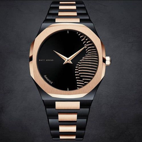 MA 860 Voyager Rose-gold Black is a quartz-powered analog watch.  This design is subtle, slim, elegant and minimalistic, suiting the professional with an eloquent taste.  The Watch can be personalized with a name or initials in the front and engraving on the back.