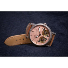 Load image into Gallery viewer, With this newest edition of our Dual Escapement Collection, we are expressing the beauty and elegance of bronze and copper metals through a heat-tempered brushed stainless steel casing and the gorgeously finished copper dial on bronze background. The idea was to create a premium luxury piece with the flair of a modern vintage automatic watch. The soft padded genuine leather strap in nubuck light brown perfects the exclusive feel to this piece.
