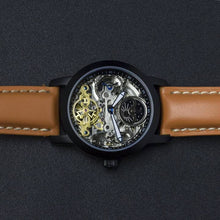 Load image into Gallery viewer, Esprit Libre, a delicate showcase of the fine essence of a skeleton timepiece. Aesthetically perfected with inventive and meticulous architecture with a flying Tourbillon, encased with high quality 316L stainless steel casing and powered by a 21 jewel automatic movement with a 60-hour power reserve and a moon phase. 
