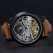 Load image into Gallery viewer, Esprit Libre, a delicate showcase of the fine essence of a skeleton timepiece. Aesthetically perfected with inventive and meticulous architecture with a flying Tourbillon, encased with high quality 316L stainless steel casing and powered by a 21 jewel automatic movement with a 60-hour power reserve and a moon phase. 
