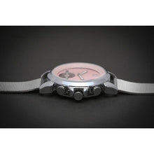 Load image into Gallery viewer, A playful and minimalistic custom made design for Her with a creative blend of pink and silver elements, silver coated casing and mesh strap, an open heart face and the extravagant case of our classic Andaluz. Feminine, Confident and Contemporary. Please allow approximately five (5) working days for assembly before dispatch can take place as this is a custom designed timepiece.
